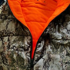 Like new, Reversible camo/hunters orange vest